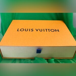 Louis Vuitton drawer with small dust bag .